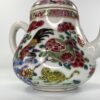 Chinese cockerel and cat teapot, c. 1740, Qianlong Period. Handle