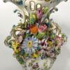 Minton porcelain garniture, flower encrusted, c. 1830.