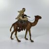 Franz Bergman bronze Arab riding a camel, c. 1900.