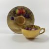 Royal Worcester ‘Fruit’ cup and saucer, signed. Dated 1918.