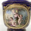 ‘Sevres’ porcelain ‘Jewelled’ cache pot, c. 1870. cherub