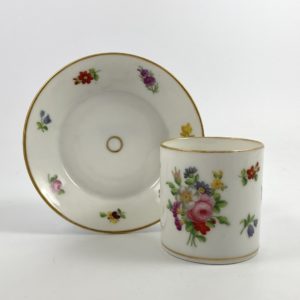 Paris porcelain coffee can and saucer, c. 1830.