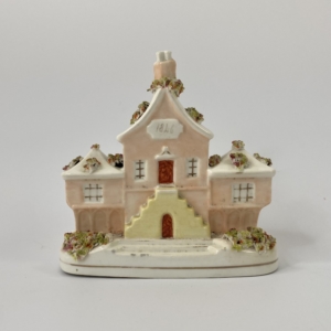 Staffordshire porcelaneous cottage, dated 1846.