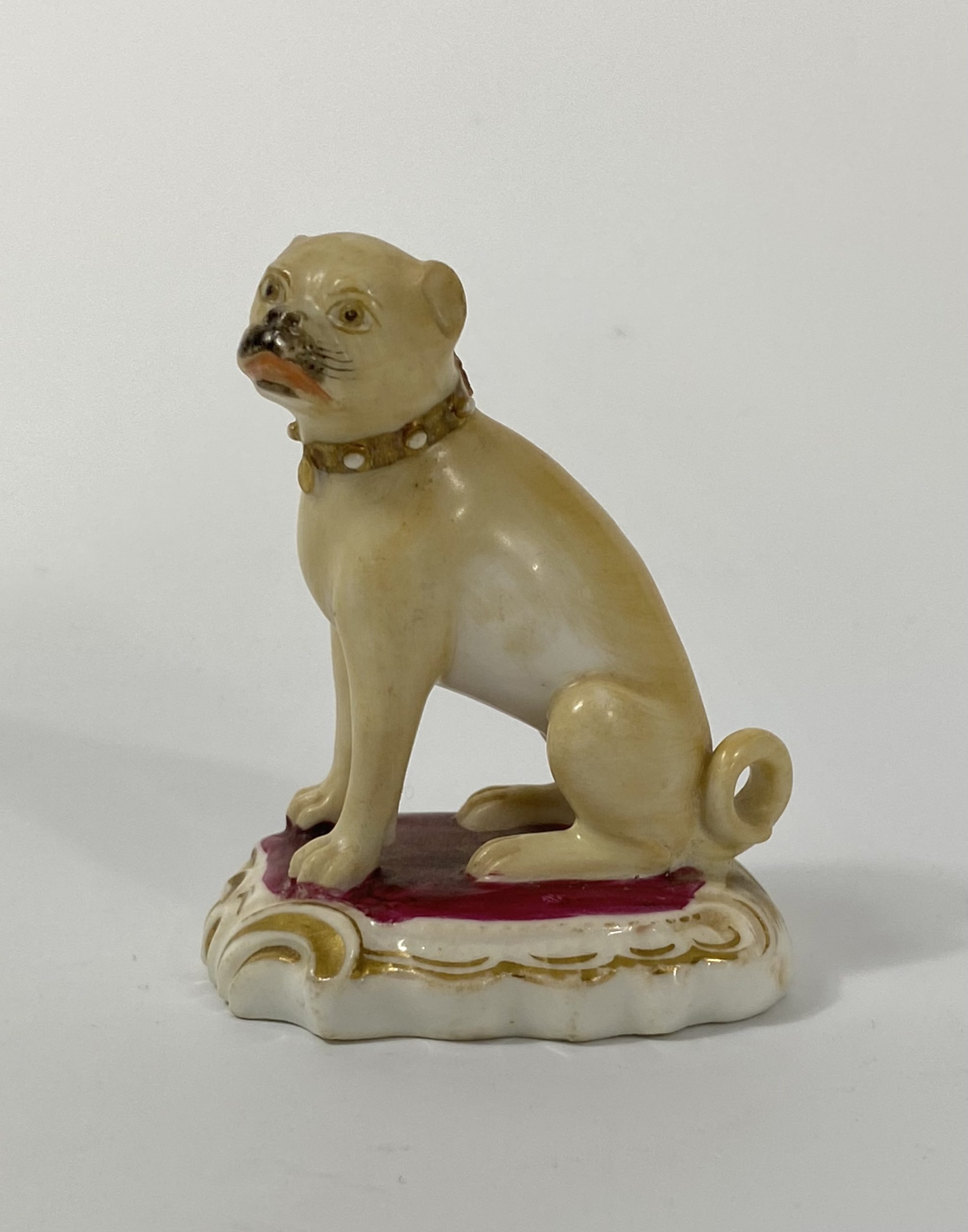 Rockingham porcelain pug dog, c. 1835
