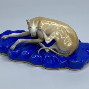 Copeland porcelain recumbent Greyhound, c. 1830.