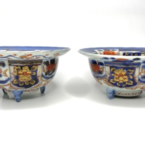 Pair Imari porcelain tripod bowls, Arita, Japan, c. 1700.