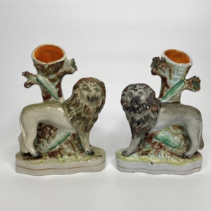 Staffordshire pair of Lion spill vases, c. 1850.