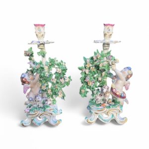 Pair of Bow porcelain bocage candlesticks, c. 1765.